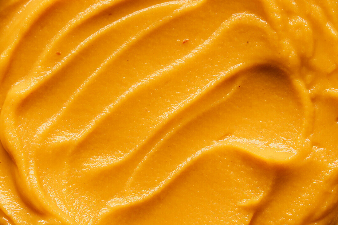 Swirl of pumpkin puree close-up