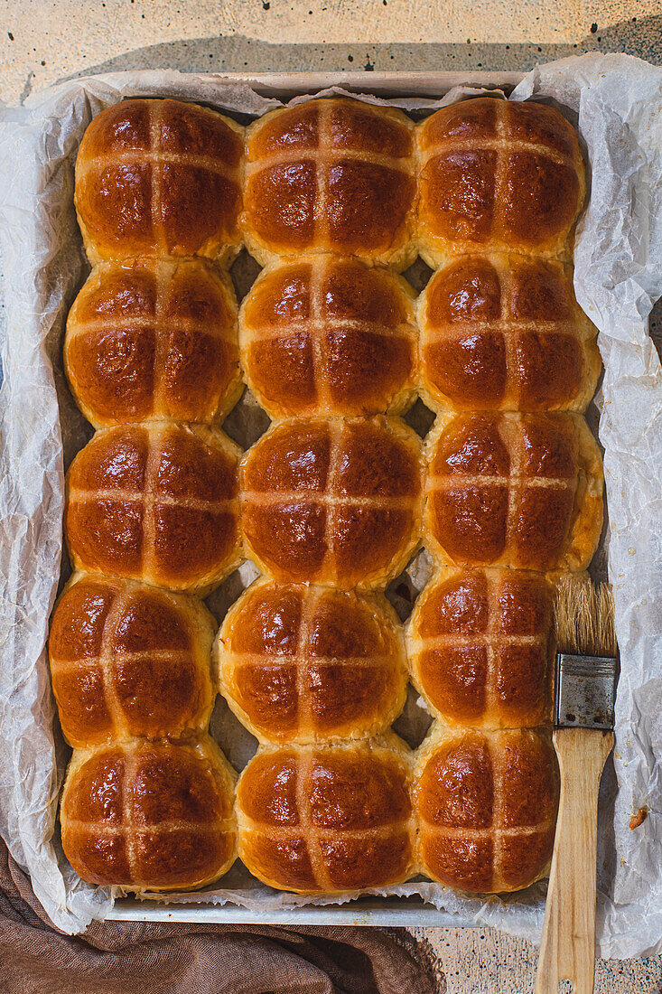 Hot cross buns in a baking tray