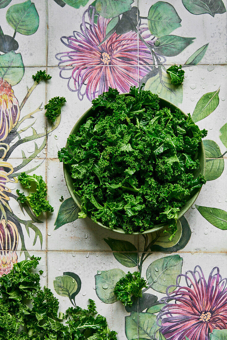 Kale on a plate with a flowered background