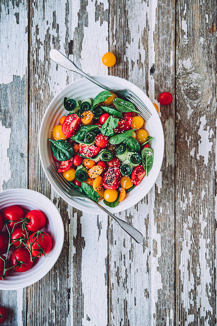 Summer salad on a wooden background