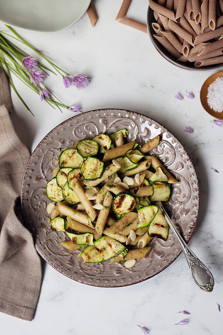 Noodles with grilled courgettes. View from above