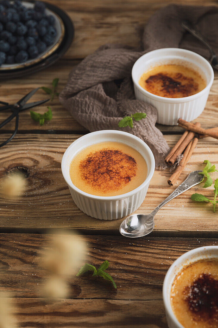 Crema Catalana Spanish custard on a wooden kitchen plate