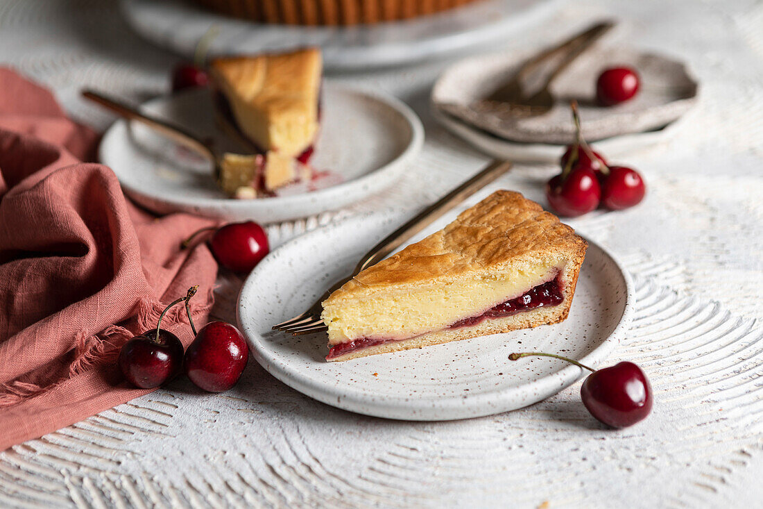 Basque cake with custard and cherry compote