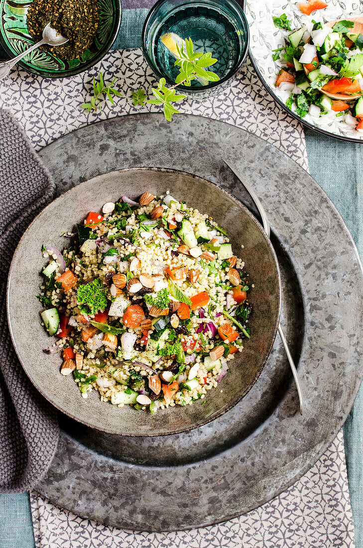 Palestinian couscous in a grey bowl