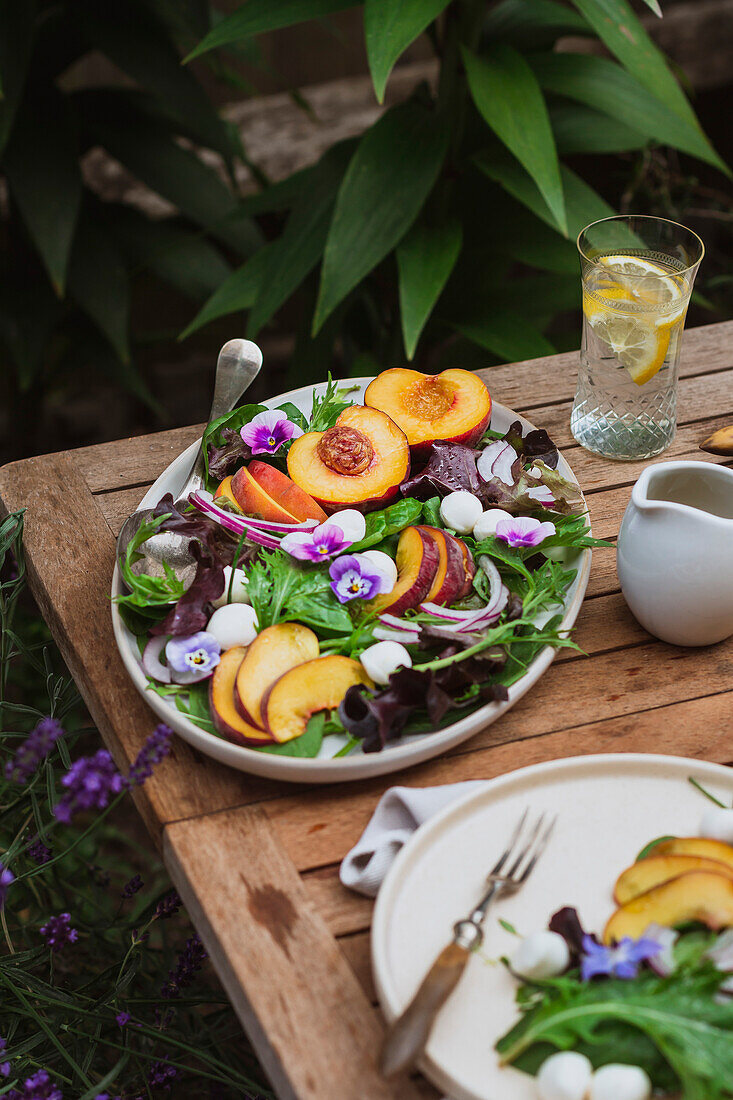 Peach, mozzarella and violet salad