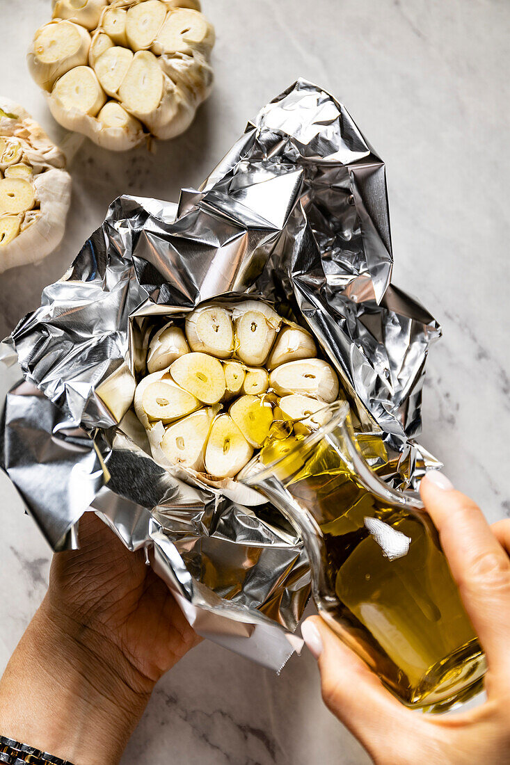 Home-baked garlic cloves in baking foil