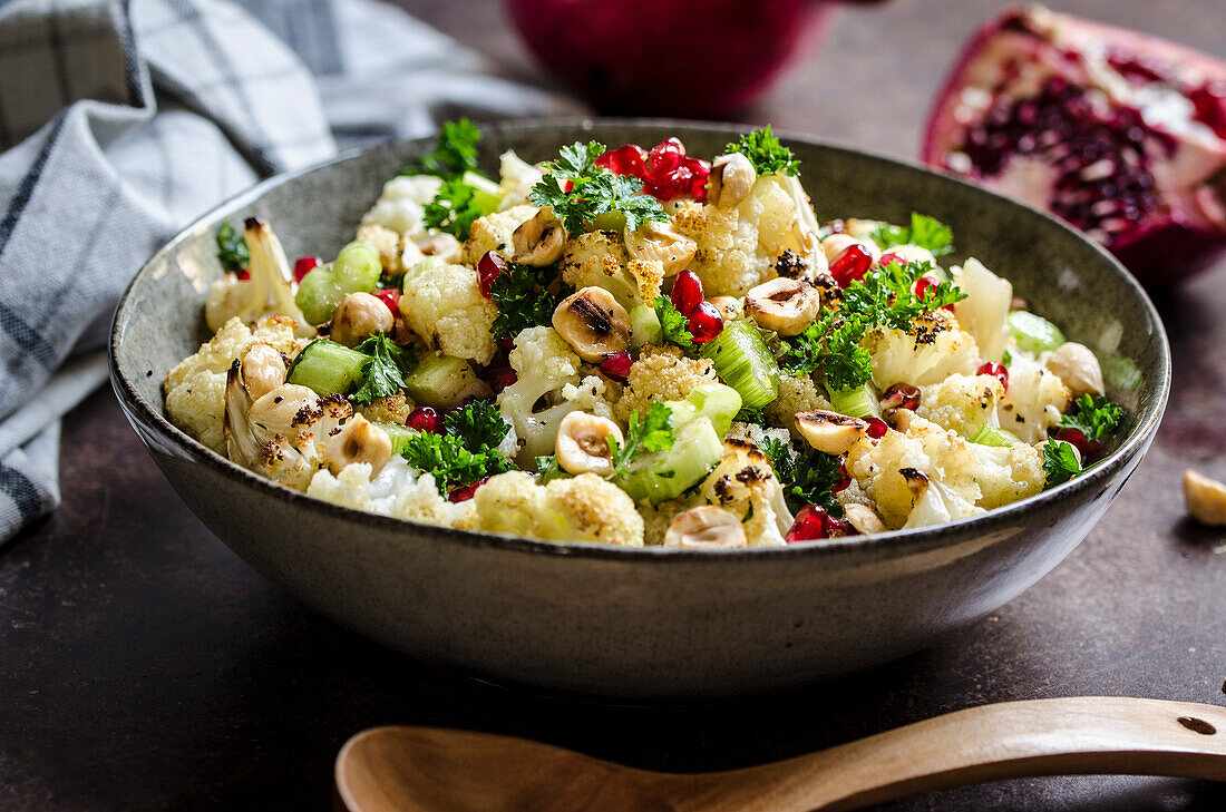 Cauliflower salad with pomegranate and hazelnuts