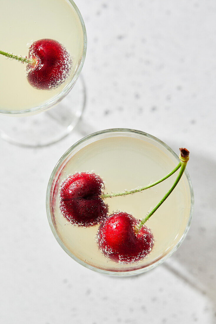 Lemon sparkling water with cherries