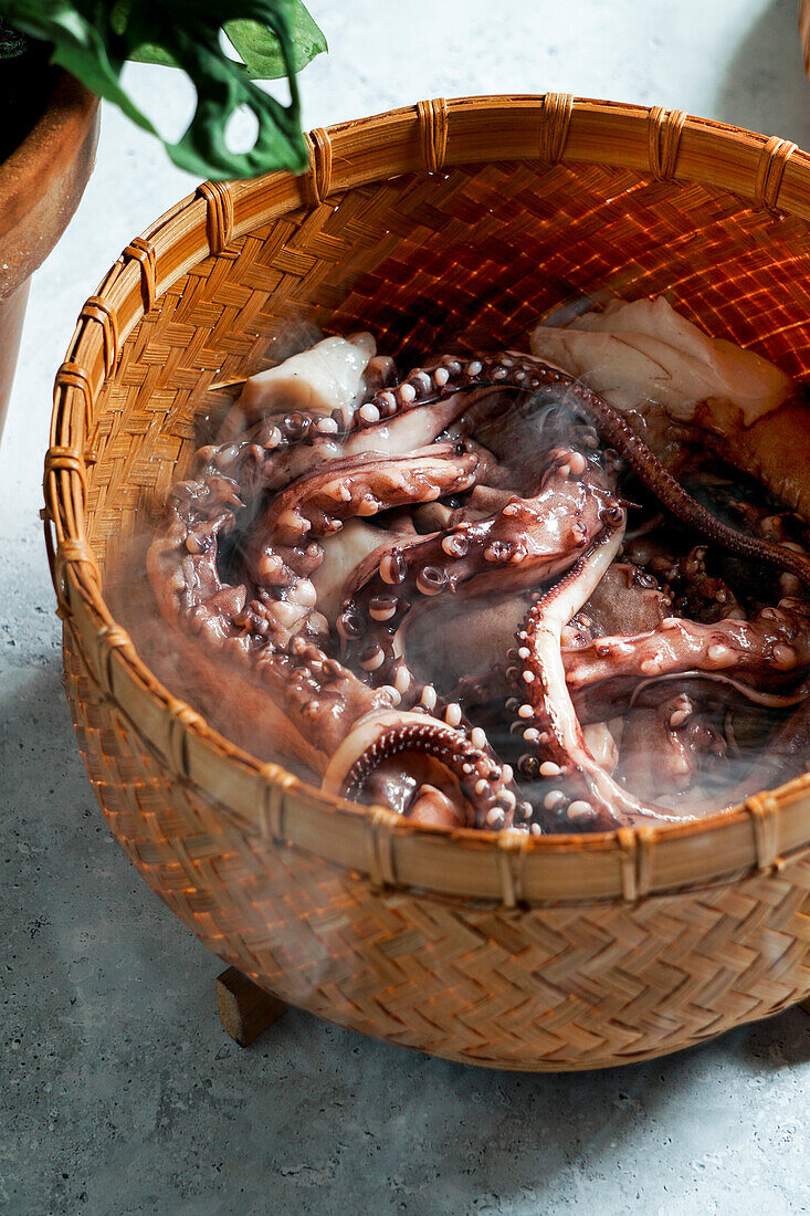 Steamed octopus in a bamboo steamer, Asian style