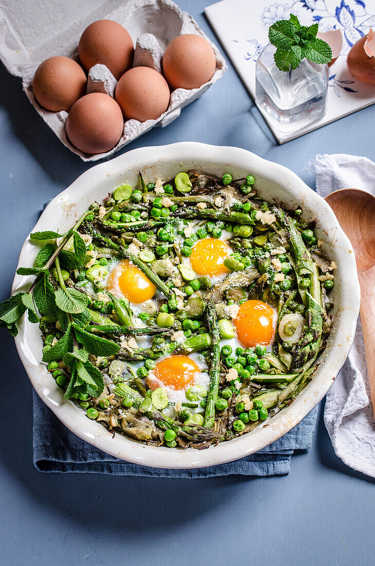 Spring vegetable stew with eggs