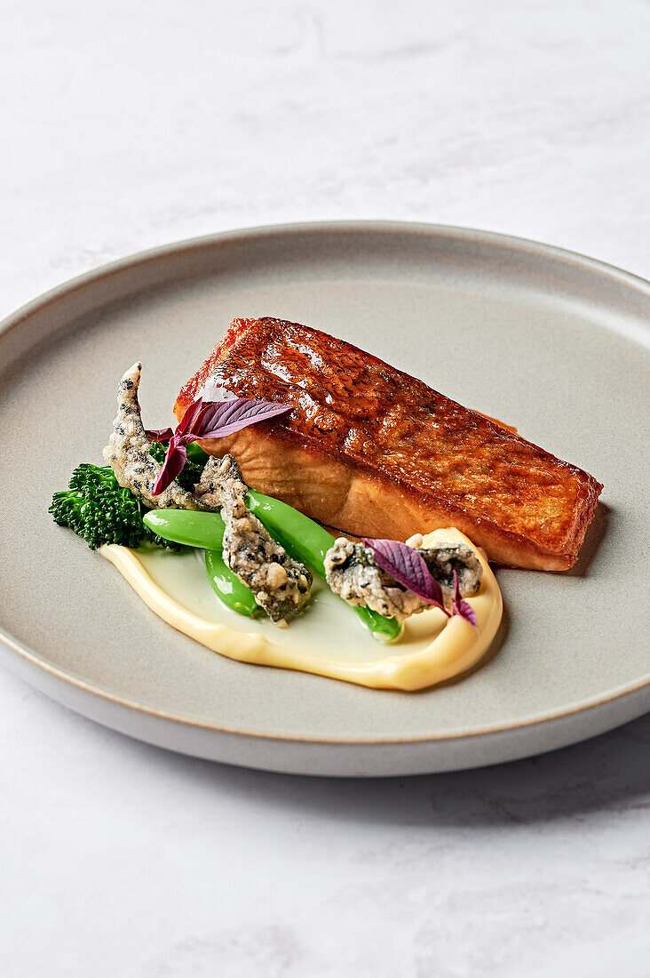 Salmon fillet glazed with miso, cauliflower puree, sugar snaps, broccolini, crispy nori