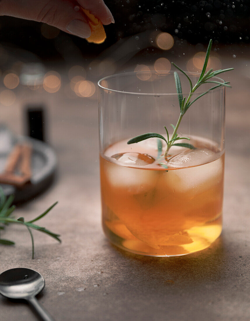 Old Fashioned cocktail in a tumbler with bitters, whiskey and sugar