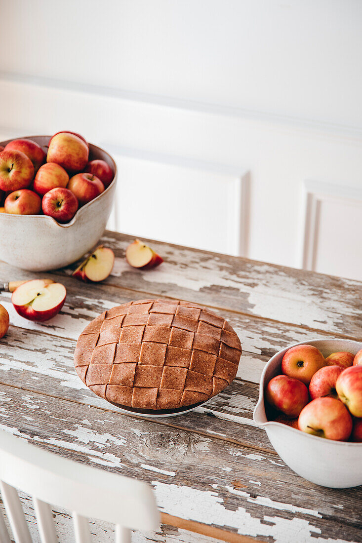 Apple pie on a rustic kitchen table