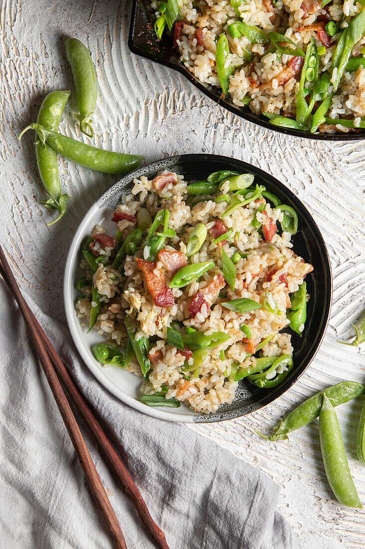 Fried rice with bacon and mangetout