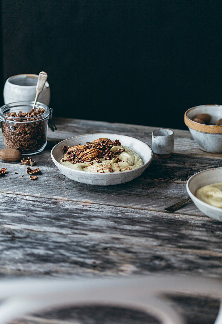 Vegan vanilla smoothie bowl with nut topping