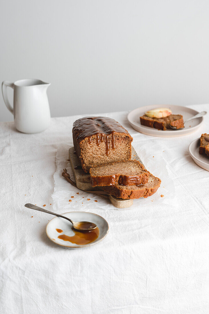 Breakfast apple cake with salted caramel on a table