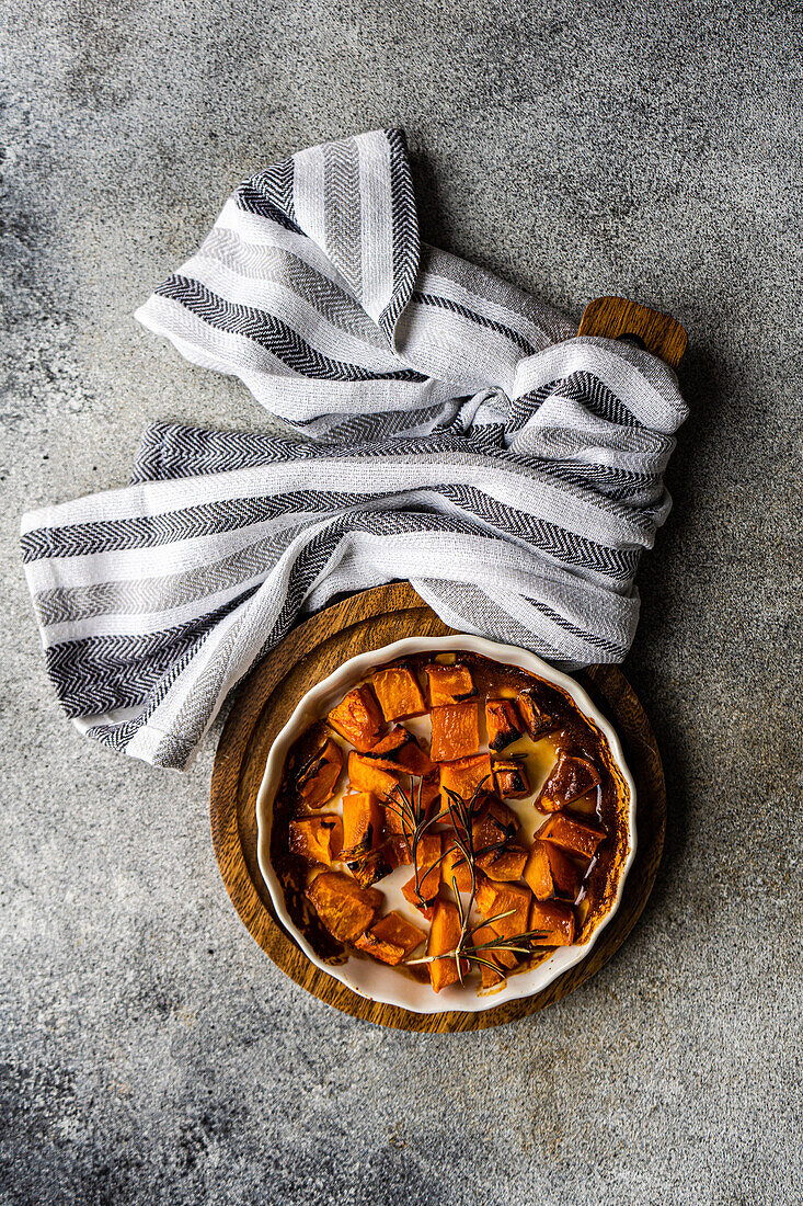 Sweet baked pumpkin cubes in the bowl