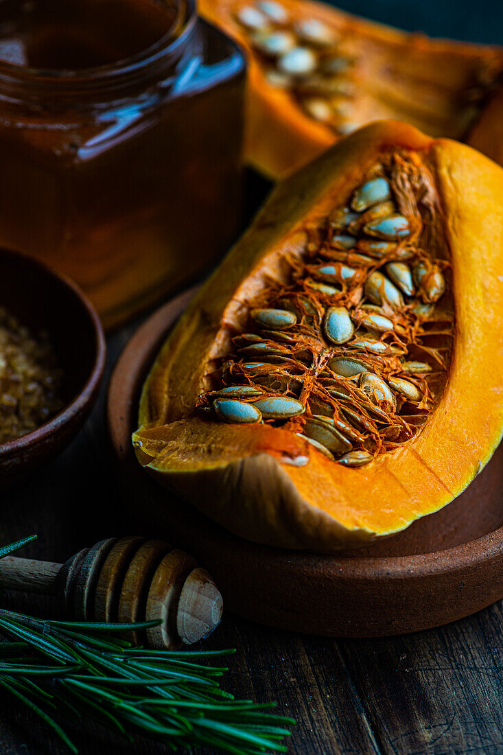 Raw pumpkin and ingredients for cooking healthy lunch dish