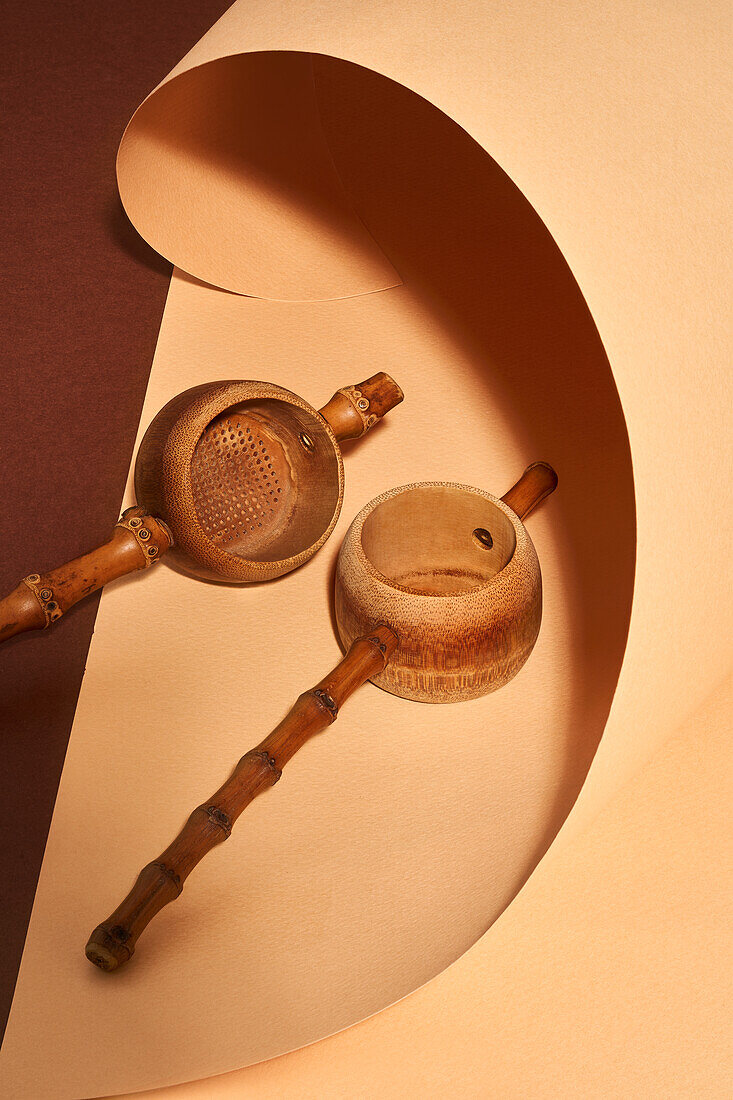 High angle of handmade bamboo tea filters on a craft paper background with a beautiful studio light