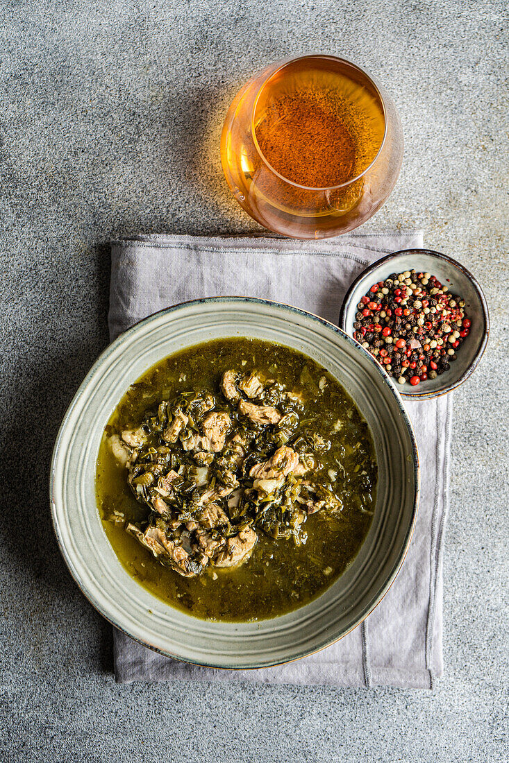 From above traditional Georgian seasonal dish Chakapuli served in the bowl