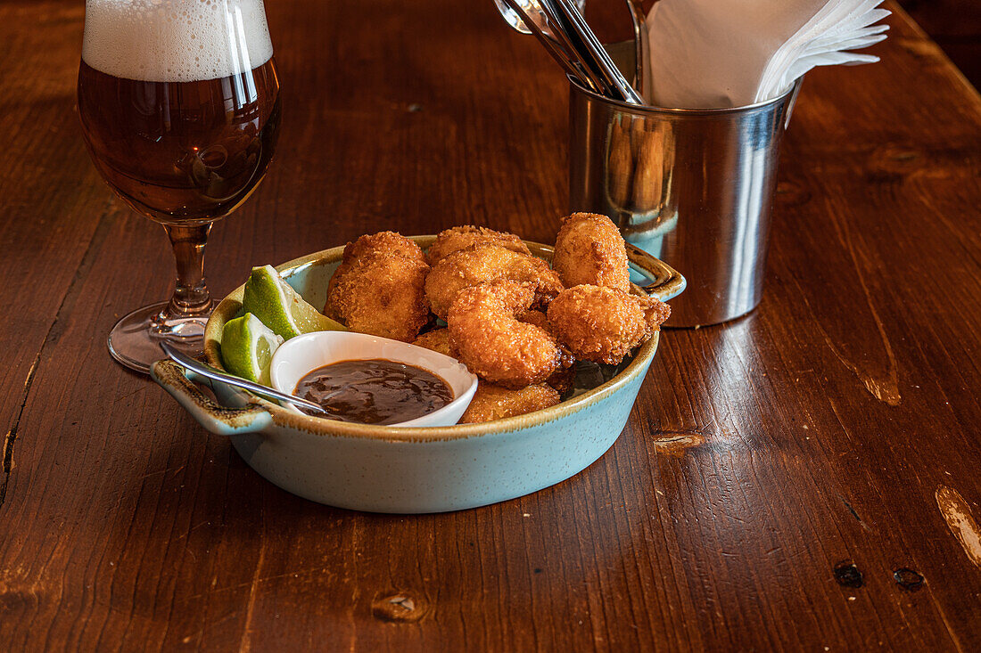 Bang bang Shrimp or butter fried crispy shrimp with fresh lime and berry sauce appetizer in the bowl