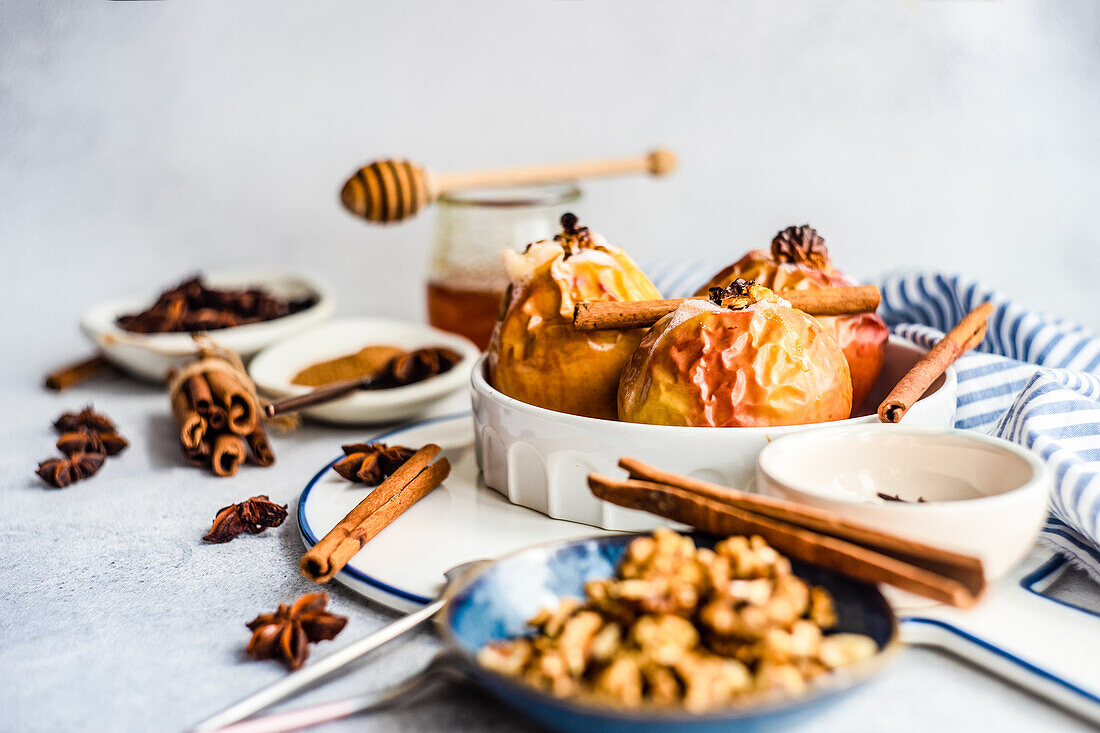 Baked apples with honey and walnuts served with spices