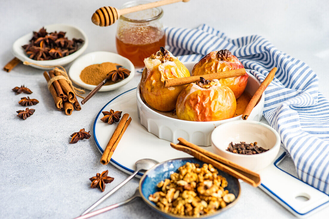 Baked apples with honey and walnuts served with spices