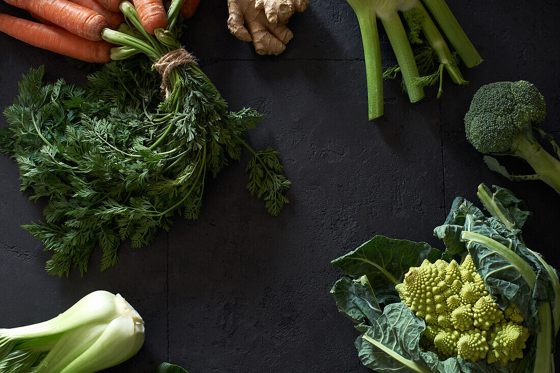 Food concept, flat lay with fresh fruits and vegetables on dark background