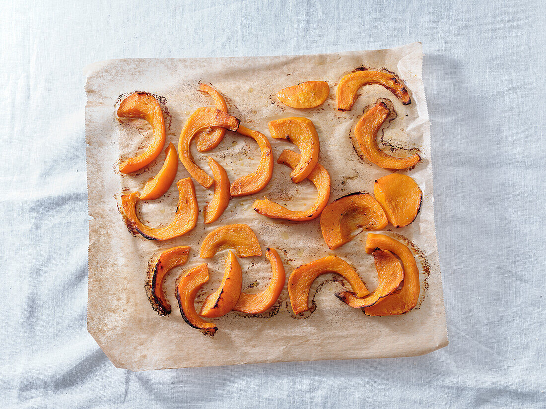 From above a tray with roasted pumpkin