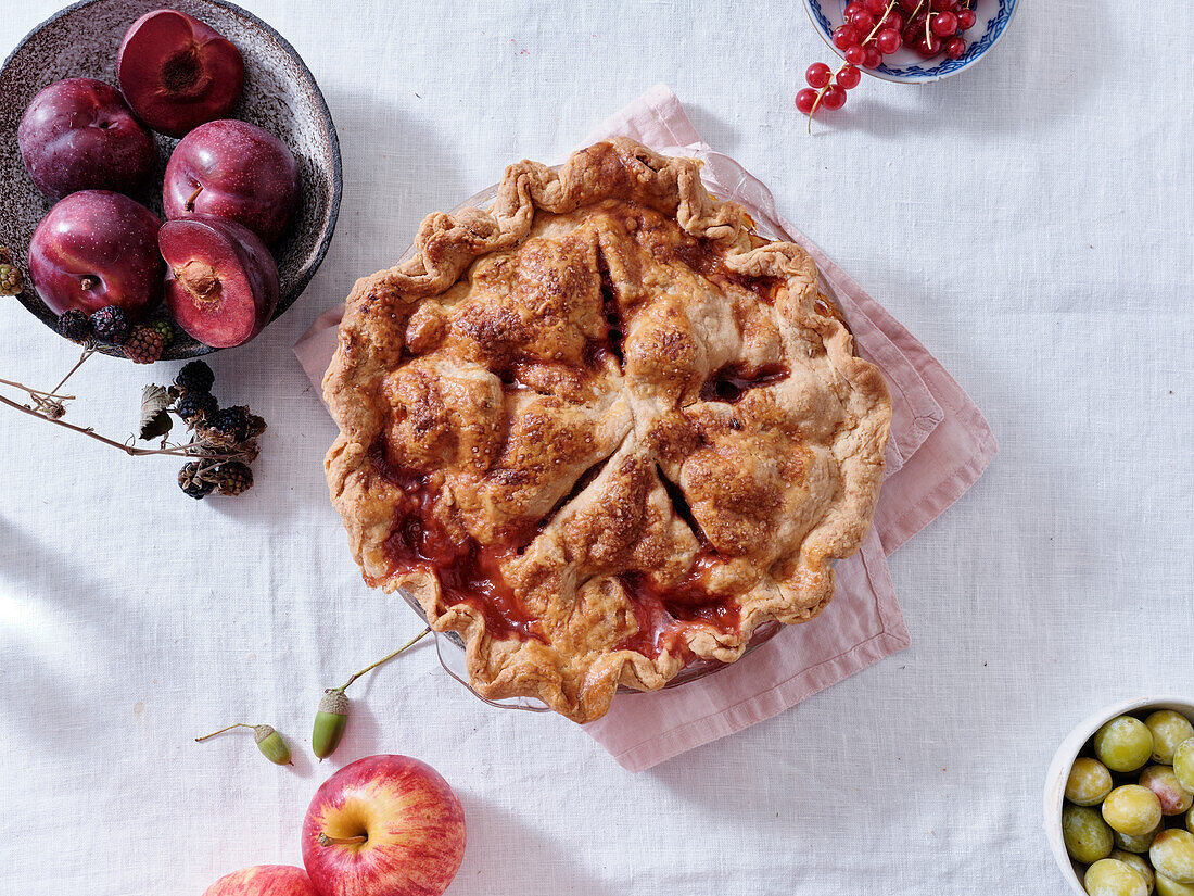 Homemade apple and red currant pie top view