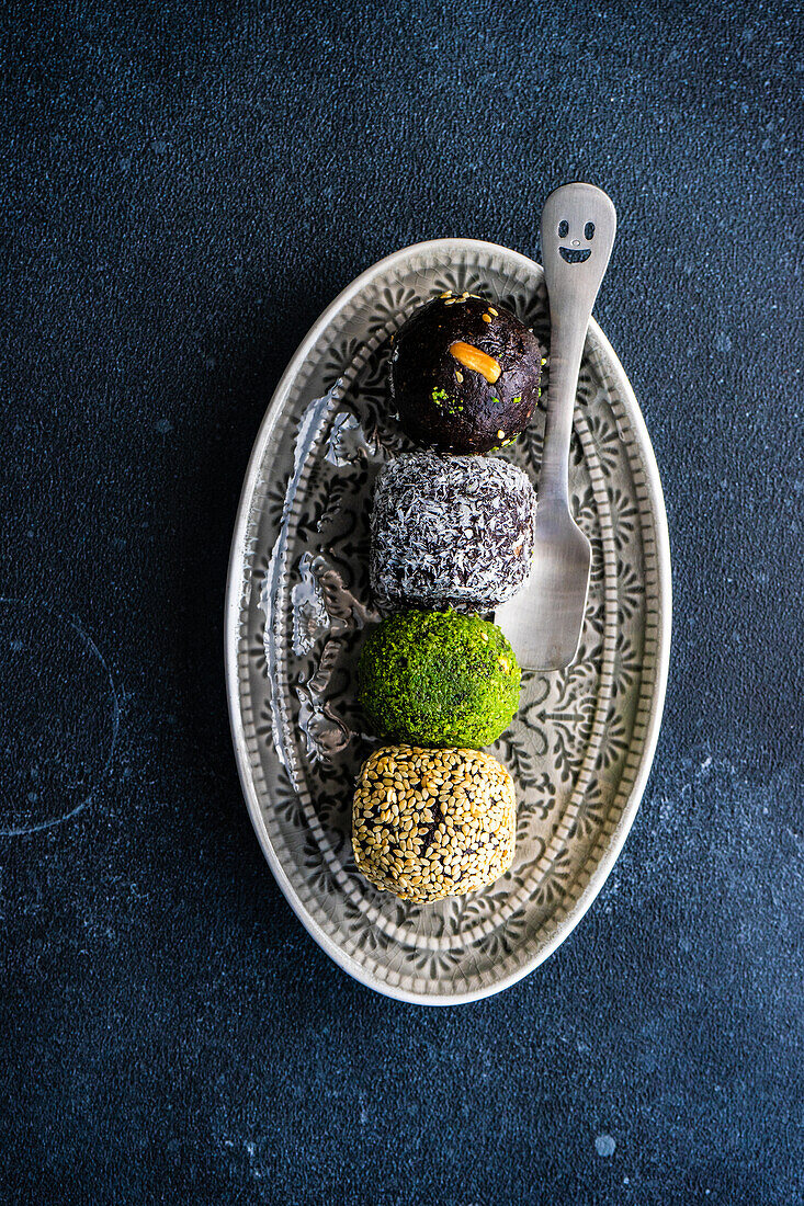 From above ceramic bowl with traditional turkish delight pakhlava balls
