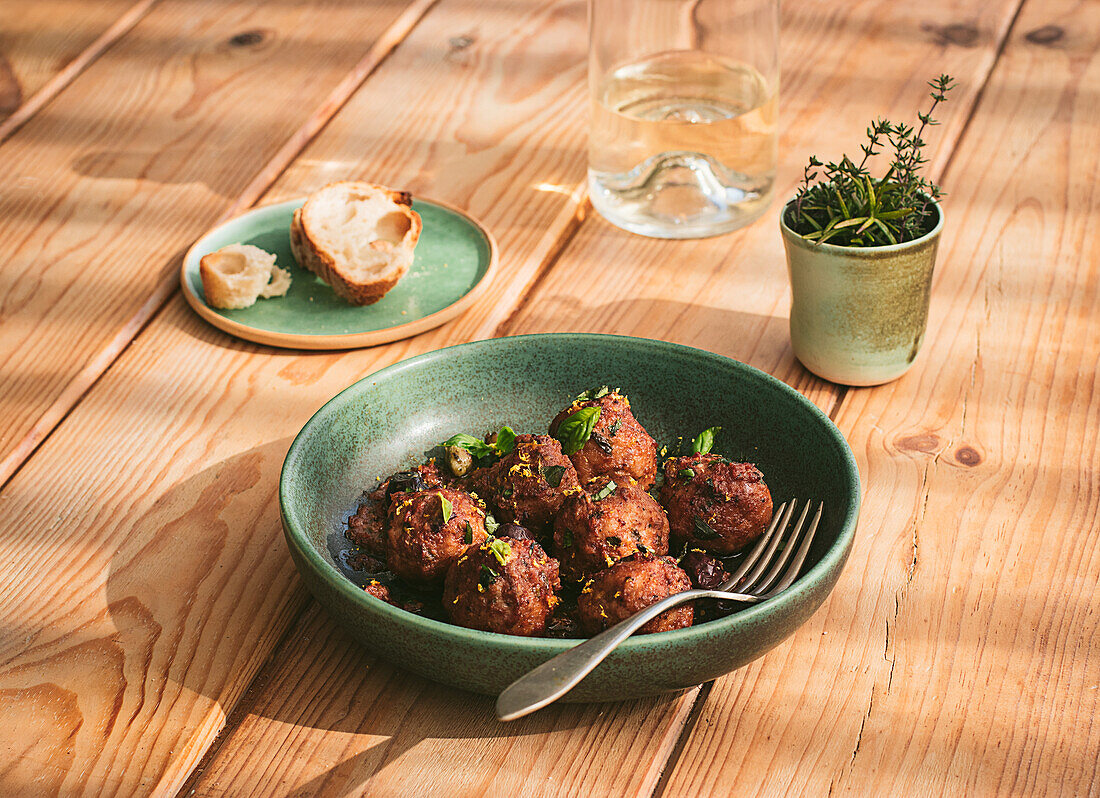 Closeup of a plate of meatloaf with some parsley