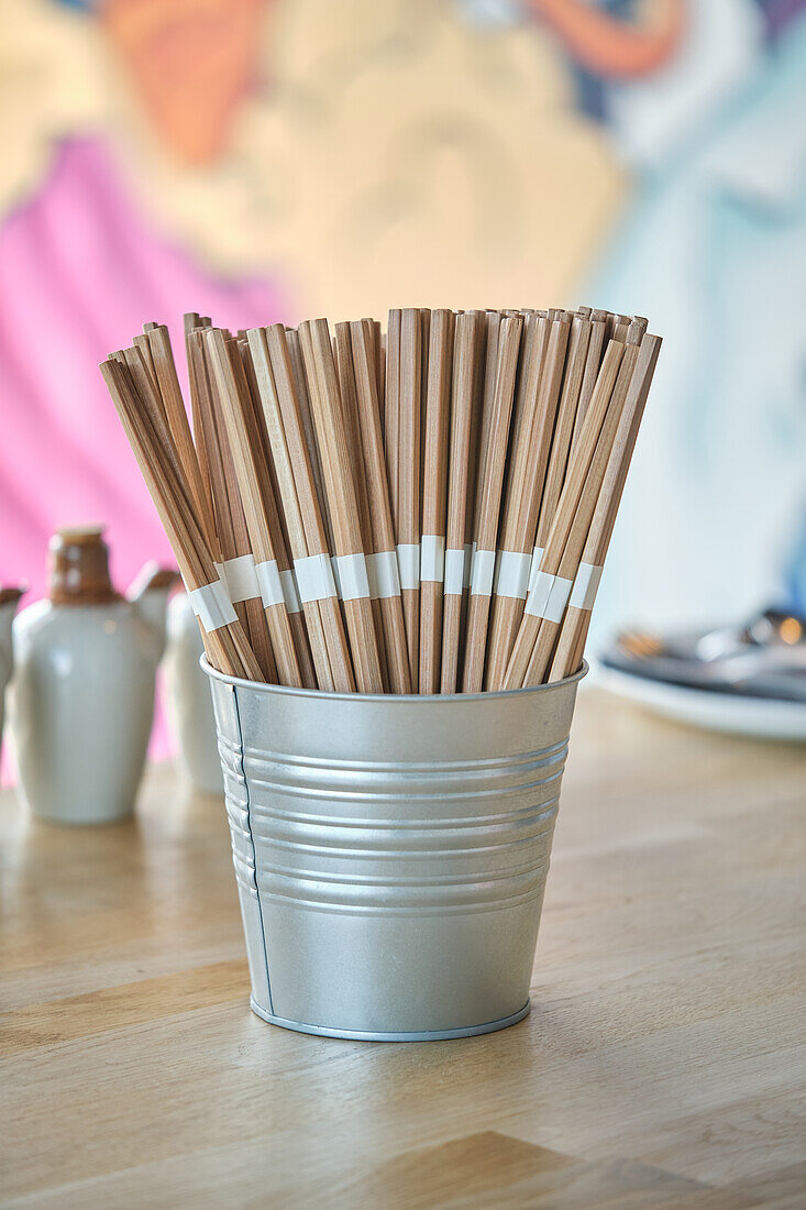 Stock photo of chopsticks sets in japanese restaurant.