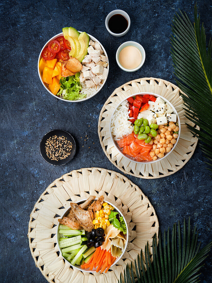 Delicious poke bowl with many ingredients seen from above