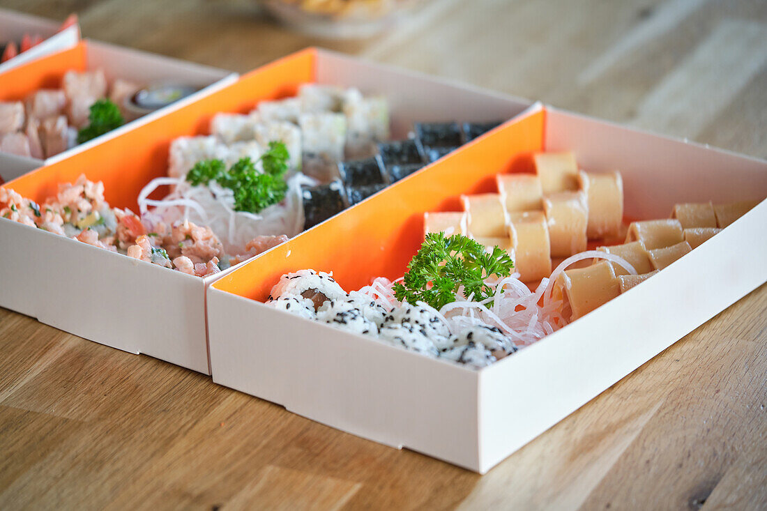 Stock photo of take away sushi boxes in japanese restaurant.