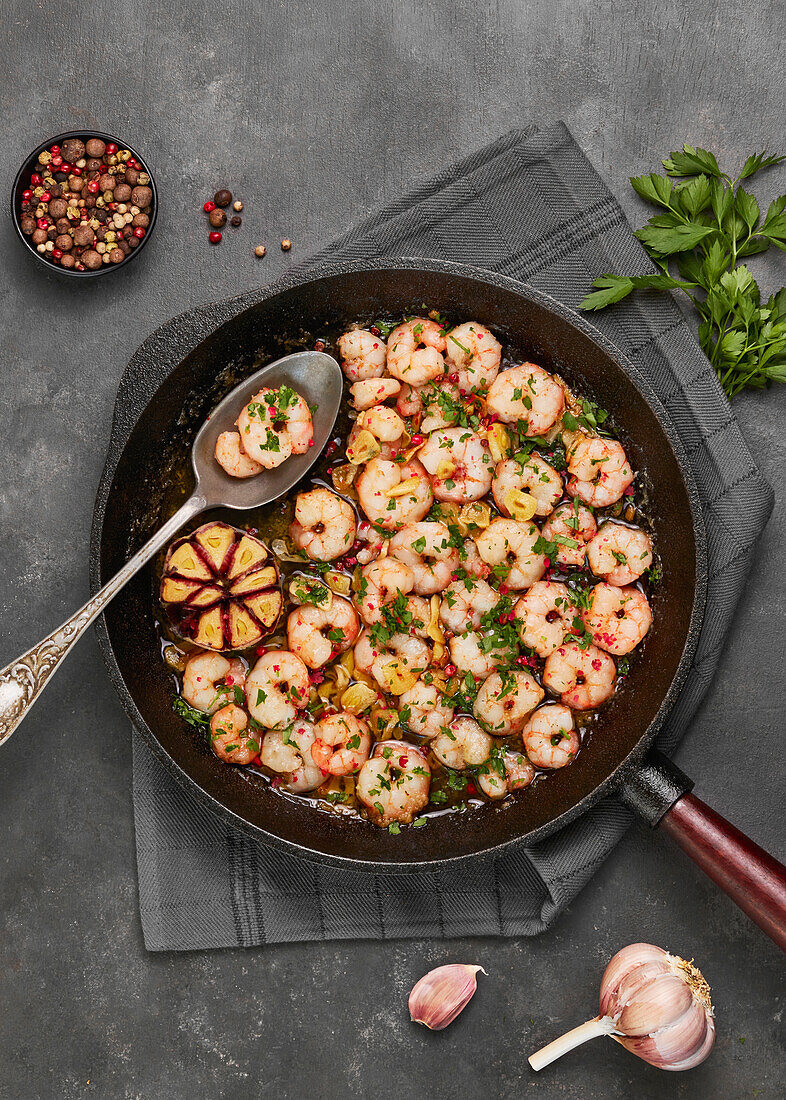 Top view shrimp scamp in a pan on grey background