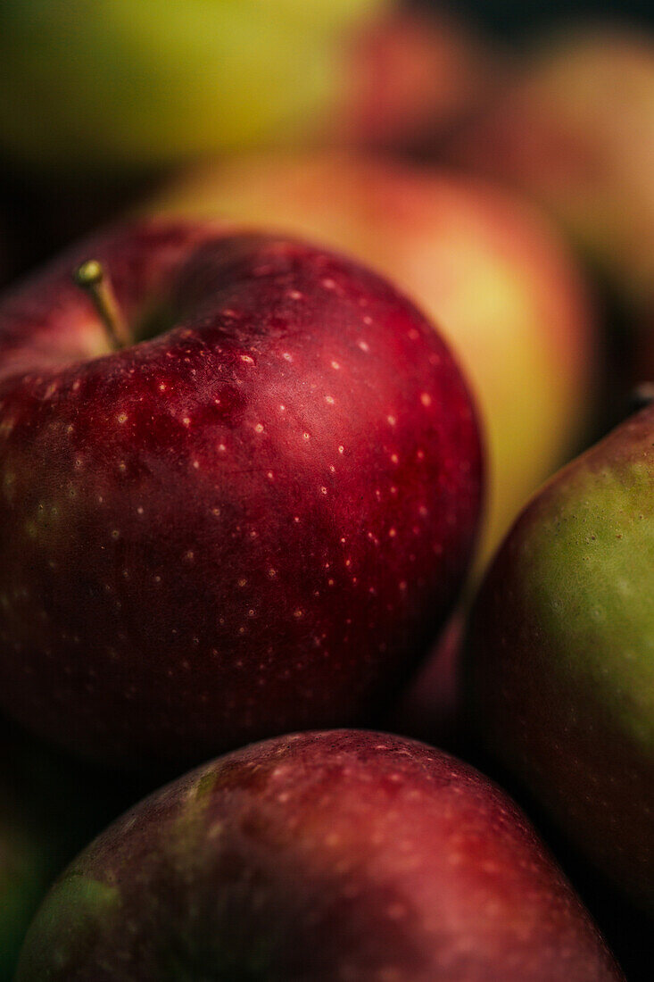 Fresh red apples on dark background