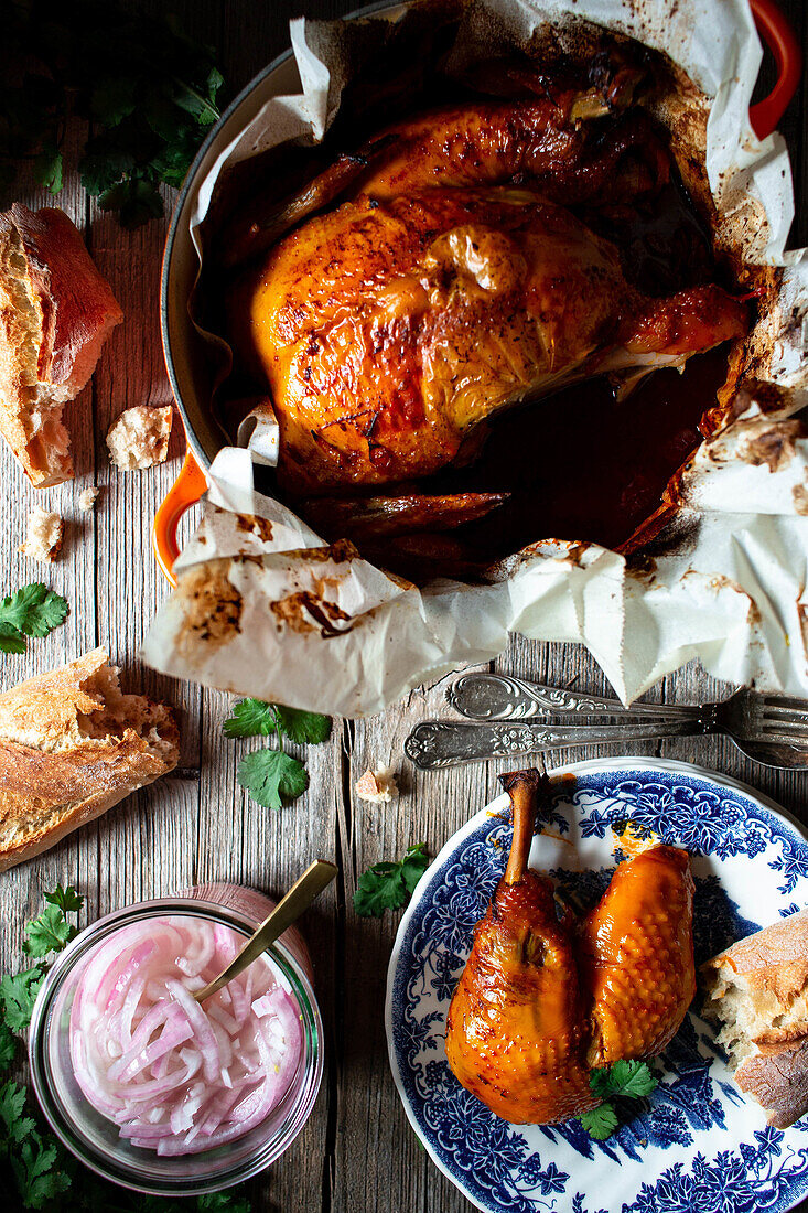 From above beautiful thanksgiving dinner with roasted chicken Pollo pibil on wooden table