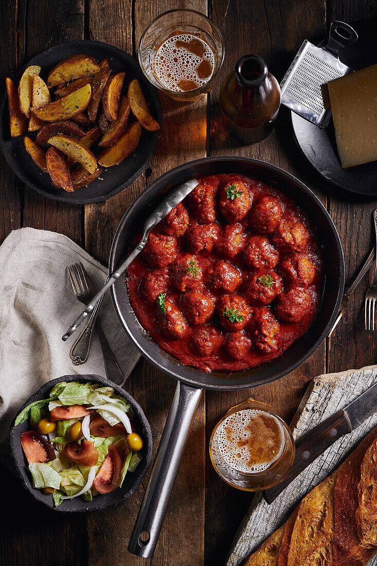 Closeup viewed from above of a plate of meatloaf with tomato