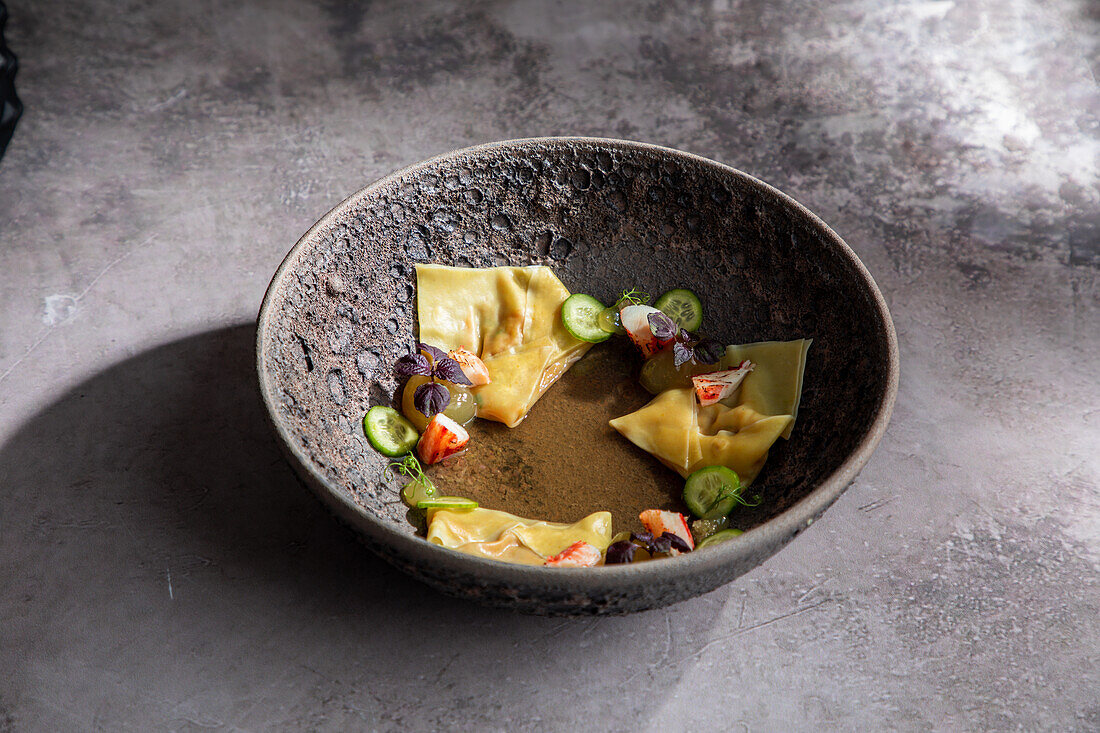 Bowl with traditional Japanese dumplings in restaurant