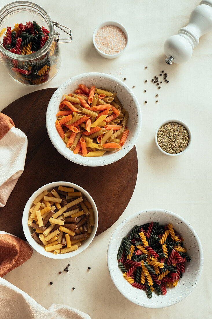 Top view of different macaroni in bowls