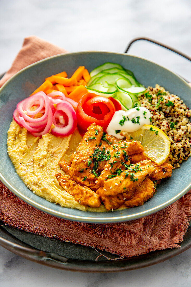 Chicken shawarma hummus bowl