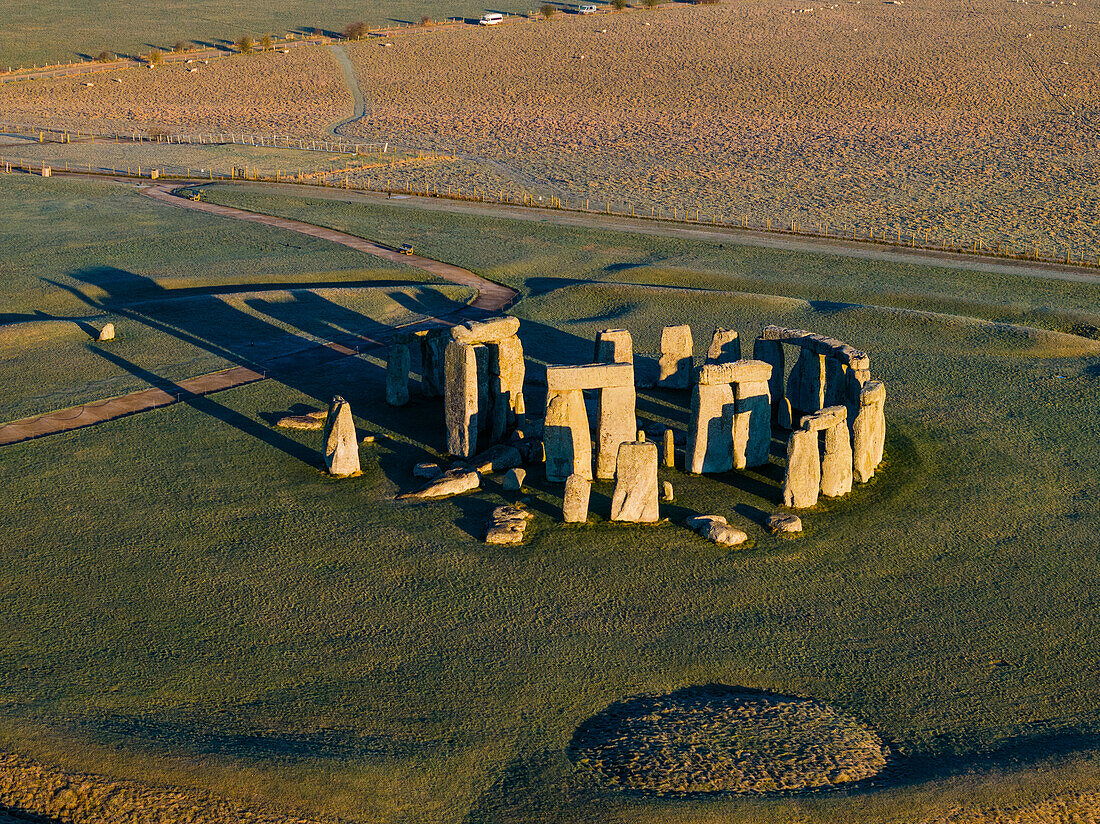 Aerial view of Stonehenge site in morning light, Wiltshire, UK