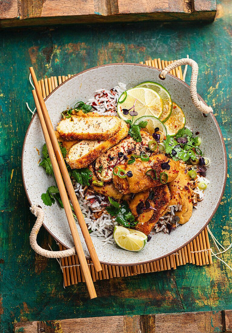 Vegan coconut milk curry with crispy tofu and rice