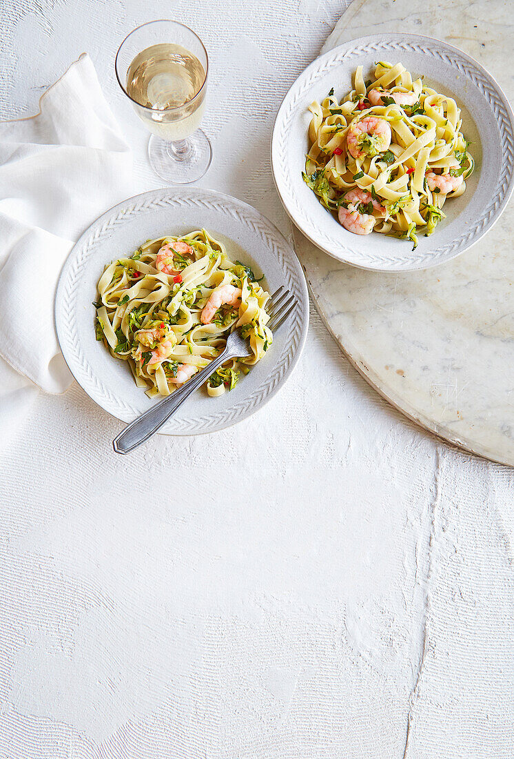 Ribbon noodles with courgette and prawns