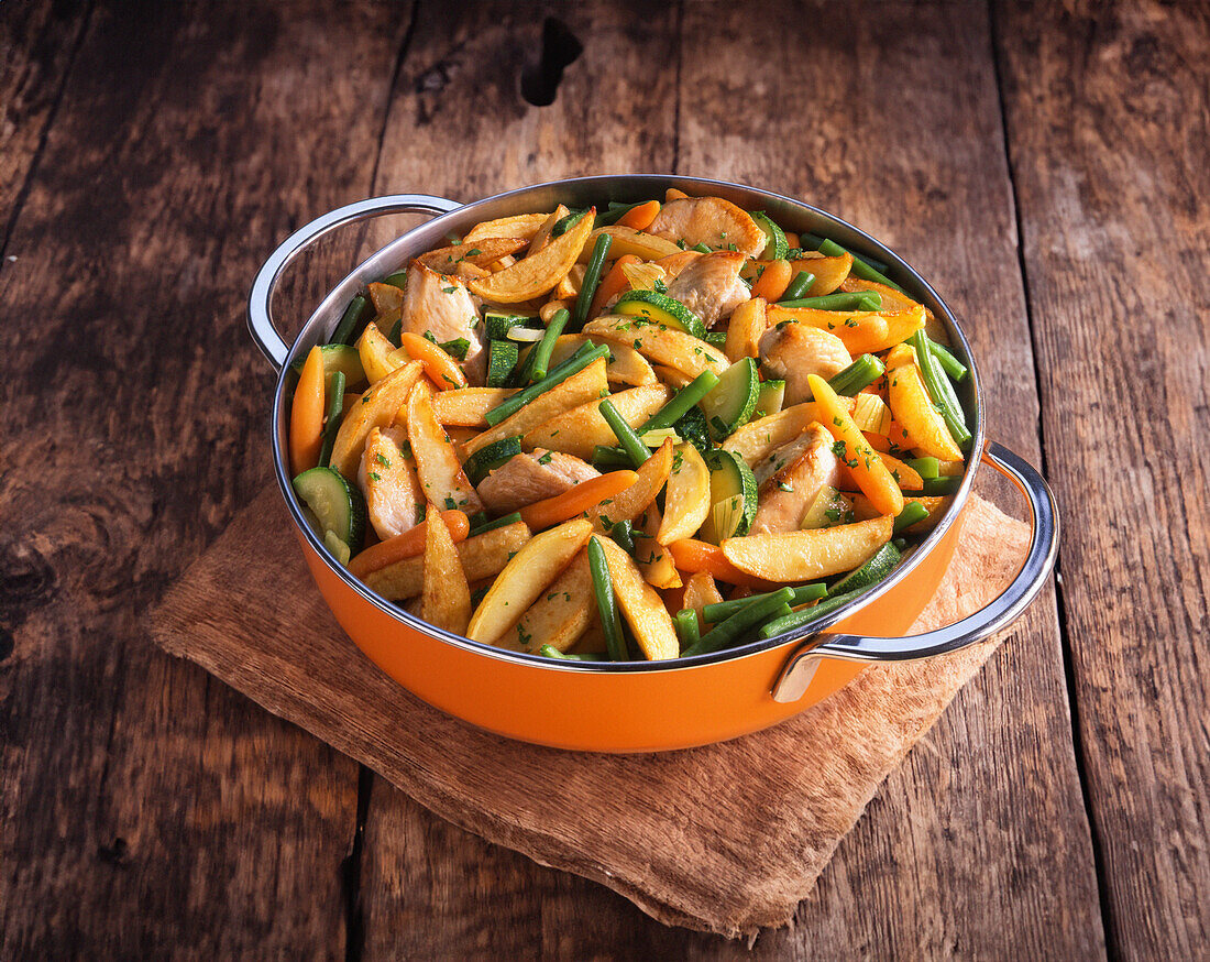 Chicken strips with roast potatoes and green beans