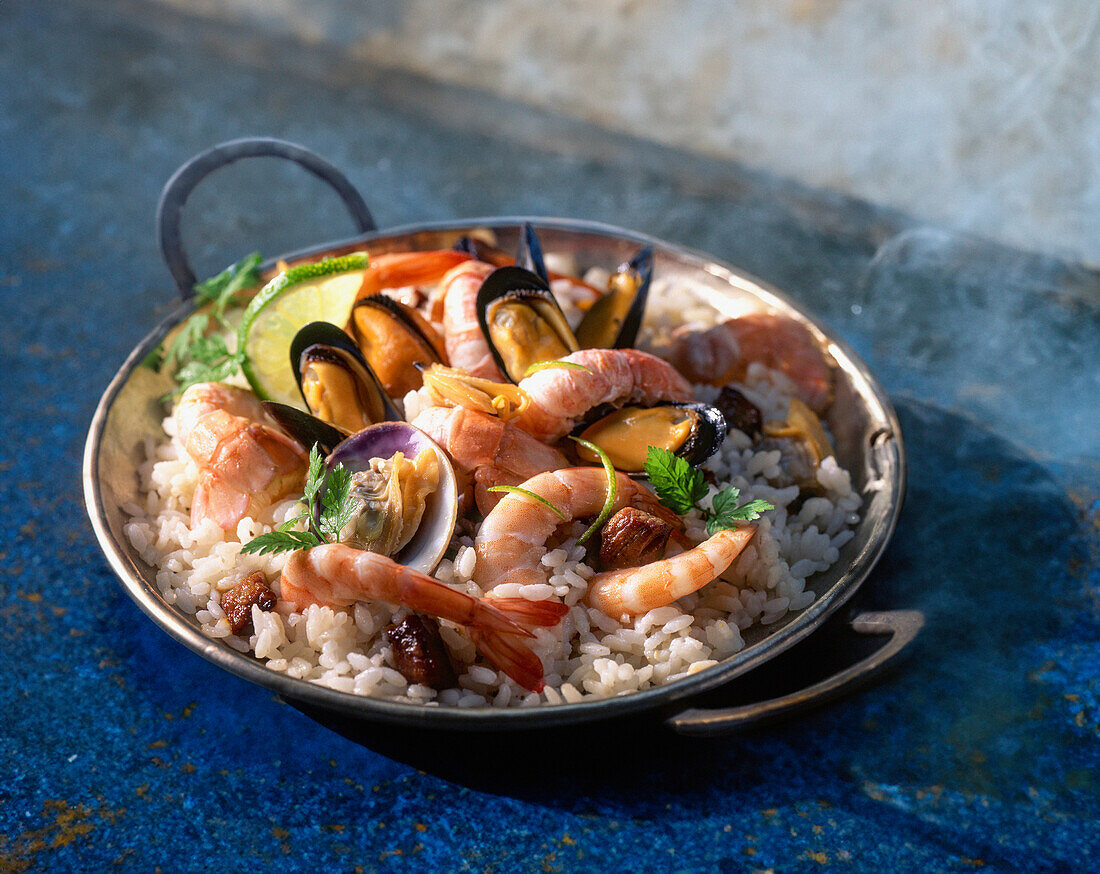 Paella with seafood and herbs