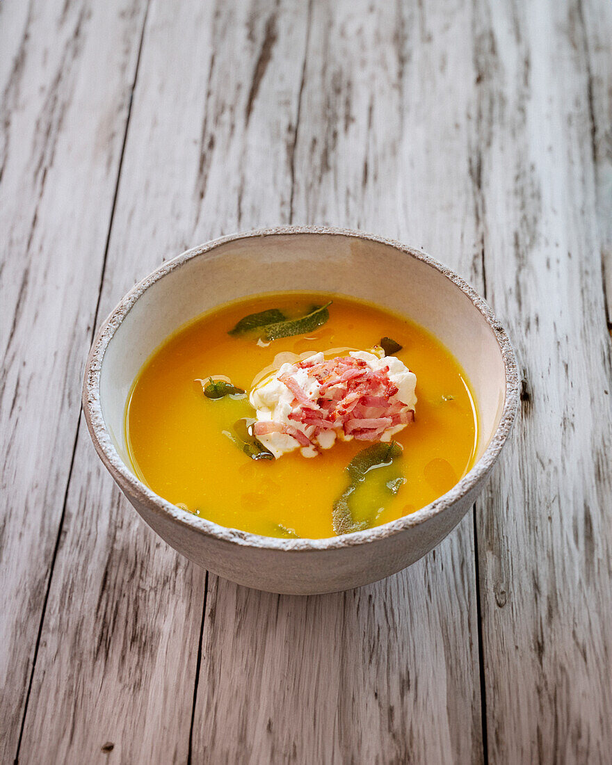 Pumpkin soup with bacon and sage