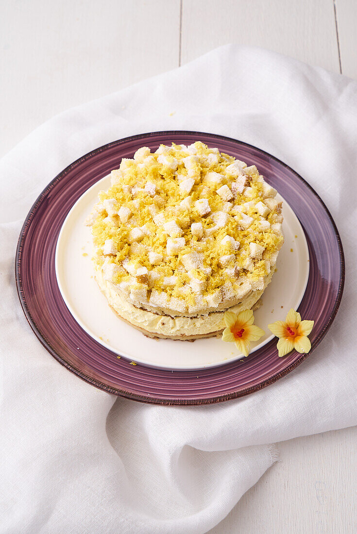 Mimosa cake with eggnog cream and sponge crumbs