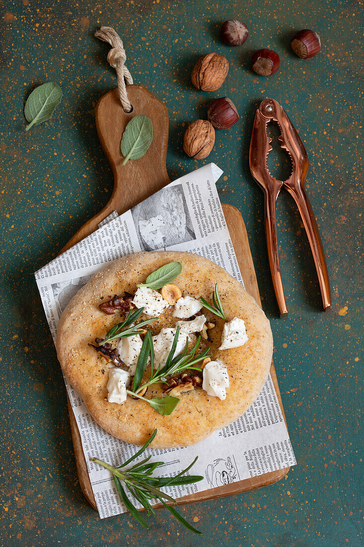 Wholemeal pizza with truffle, walnut burrata, sage and rosemary